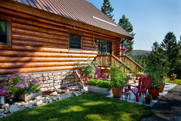 Exterior of small milled log home